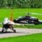 F-16 Fighting Falcon and Apache AH64 Turbine Scale RC Model Jet and Helicopter fly in formation